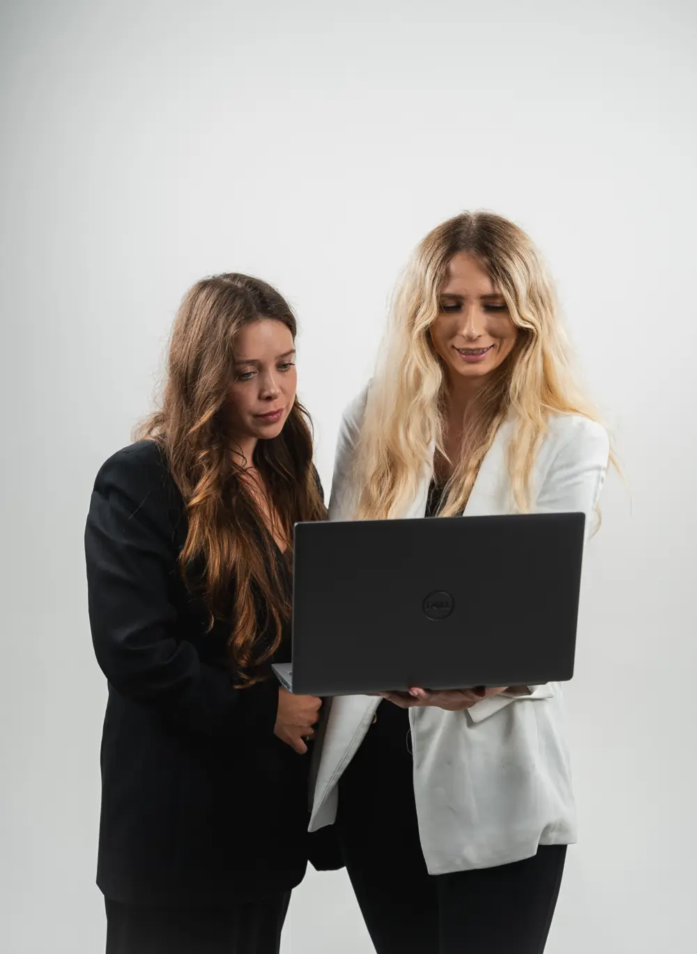 Two women with laptop